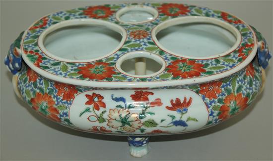 A rare and unusual Chinese Export famille verte oval desk stand, early 18th century, 25.5cm, one foot repaired